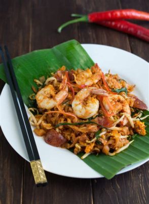  Char Koay Teow:  A Spicy Symphony of Wok-Kissed Noodles and Savory Seafood Delights!