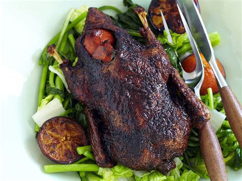  Crispy-Skinned Duck Roasted With Fragrant Spices and Savored In a Sweet-and-Sour Glaze, What Culinary Magic Awaits?