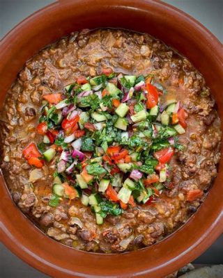  Ful Medames: Experience A Hearty Symphony of Spiced Lentils and Fragrant Garlic